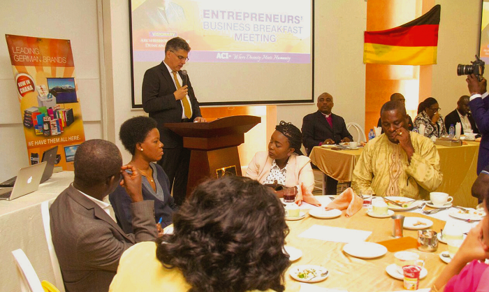  Mr Berhard Abels (left) addressing the participants